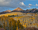 Autumn Keebler Pass, Colorado, last evening light on mountain range and aspens in fall color