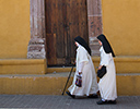 Nuns passing doorway San Miguel de Allende, Mexico