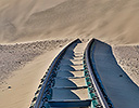 Railroad taken over by Sand dunes near Luderitz, Namibia