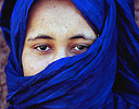 Berber Girl face covered in blue, Atlas Mountains Morocco